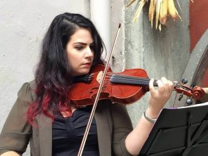 Sylvia Sippl playing violin for a wedding in Italy.